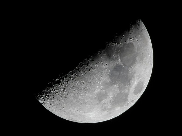 waxing crescent moon. [First Quarter Moon]